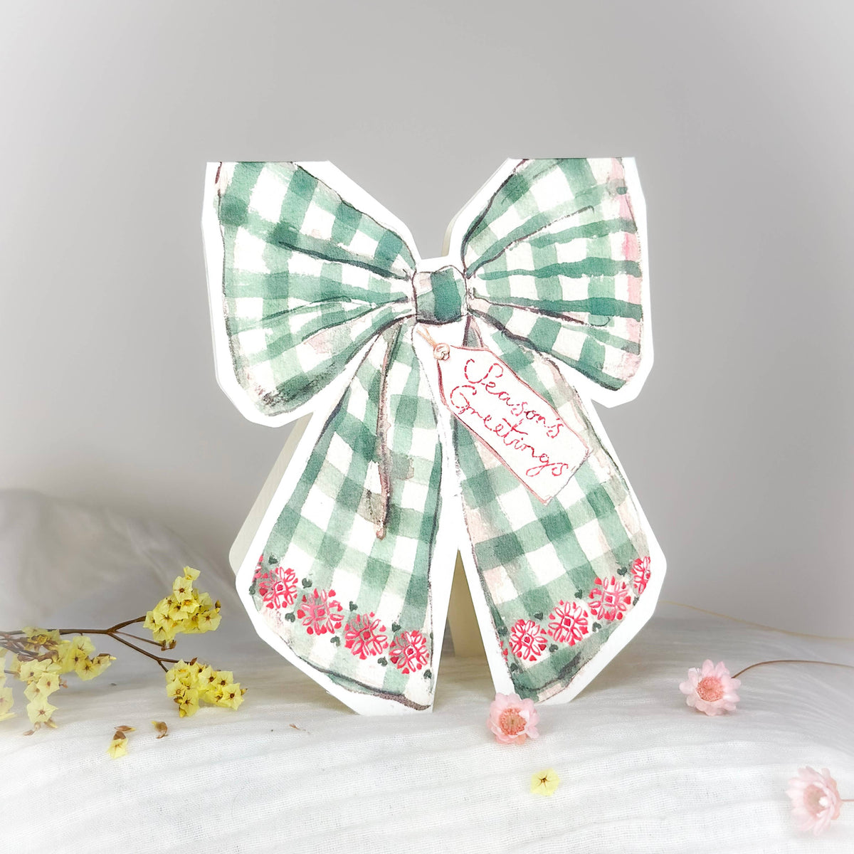 Season's Greetings bow shaped Christmas card