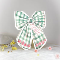 Season's Greetings bow shaped Christmas card
