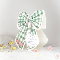 Season's Greetings bow shaped Christmas card