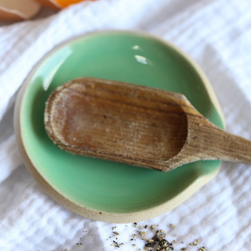 A handmade ceramic spoon rest from the Glosters pottery tableware collection.