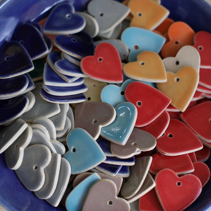 Heart shaped ceramic decorations in multiple colours from Glosters.