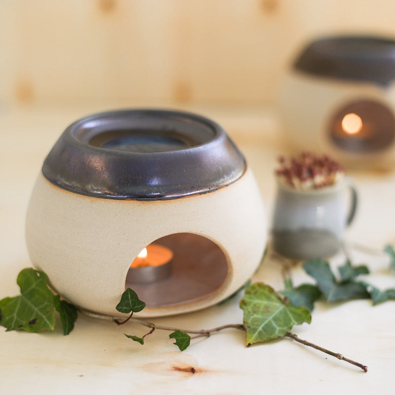 A wax melt burner made from ceramic by Glosters.