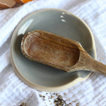 A handmade ceramic spoon rest from the Glosters pottery tableware collection.