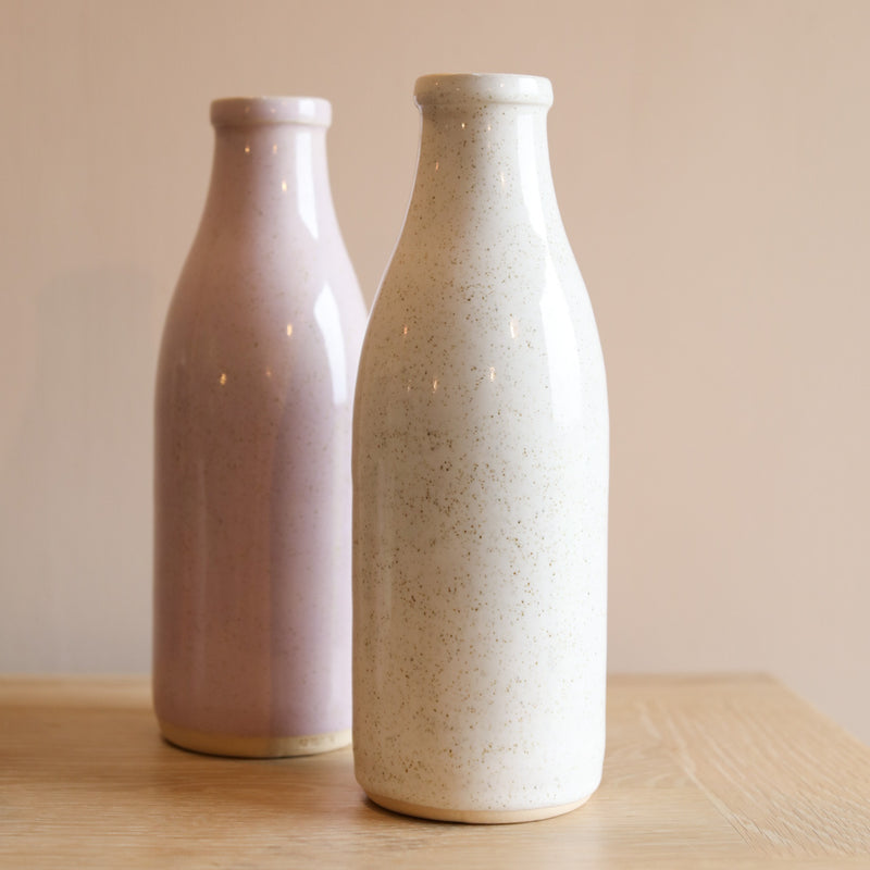 A large milk bottle vase from the Glosters pottery workshop in Wales.