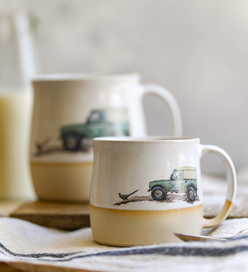 A handmade mug with an illustration of a 4x4 from Glosters.