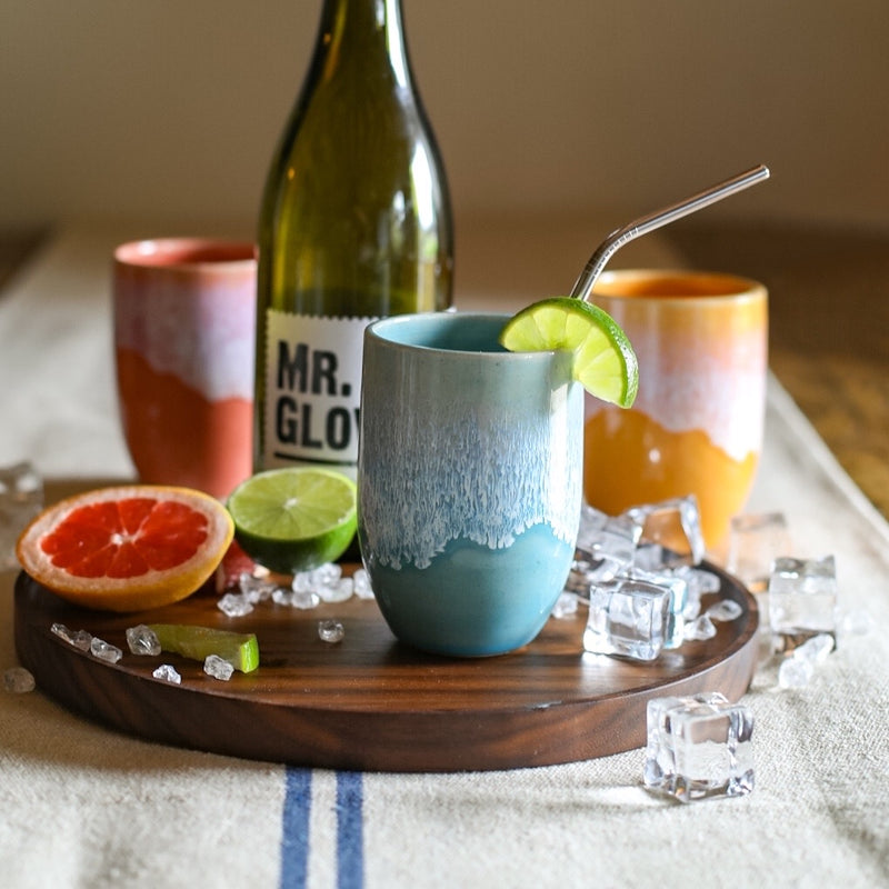 A colourful handmade stoneware drinks beaker from Glosters